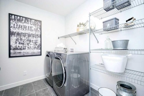 103 Wolf Creek Rise Se, Calgary, AB - Indoor Photo Showing Laundry Room
