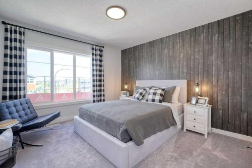 103 Wolf Creek Rise Se, Calgary, AB - Indoor Photo Showing Bedroom
