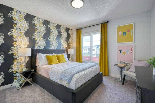 103 Wolf Creek Rise Se, Calgary, AB - Indoor Photo Showing Bedroom