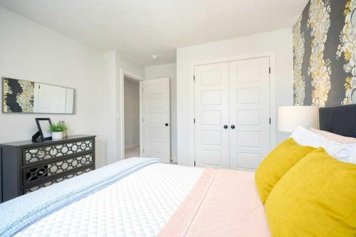 103 Wolf Creek Rise Se, Calgary, AB - Indoor Photo Showing Bedroom