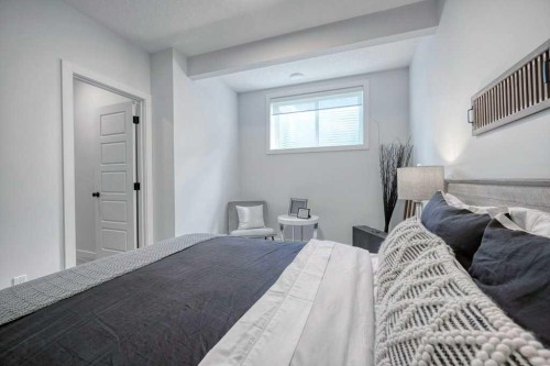 103 Wolf Creek Rise Se, Calgary, AB - Indoor Photo Showing Bedroom