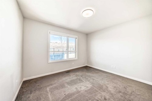 129-42 Cranbrook Gardens Se, Calgary, AB - Indoor Photo Showing Other Room