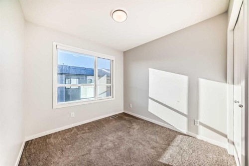 129-42 Cranbrook Gardens Se, Calgary, AB - Indoor Photo Showing Other Room