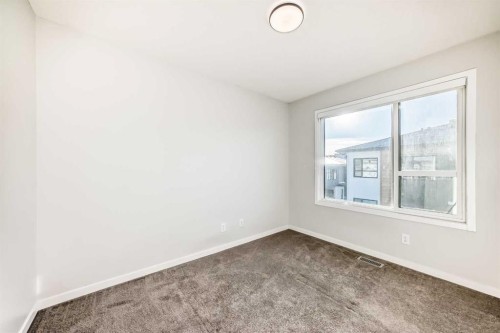 129-42 Cranbrook Gardens Se, Calgary, AB - Indoor Photo Showing Other Room