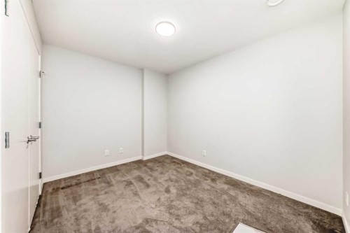 129-42 Cranbrook Gardens Se, Calgary, AB - Indoor Photo Showing Other Room
