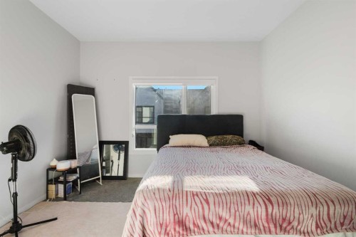 405 20295 Seton Way Se, Calgary, AB - Indoor Photo Showing Bedroom
