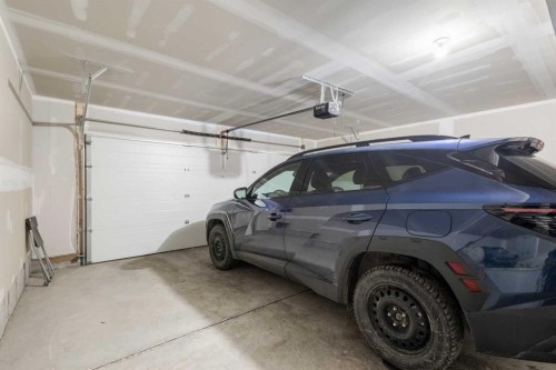 405 20295 Seton Way Se, Calgary, AB - Indoor Photo Showing Garage