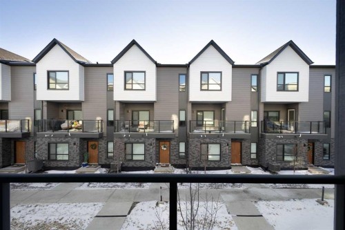 405 20295 Seton Way Se, Calgary, AB - Outdoor With Facade