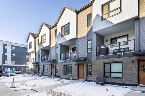 405 20295 Seton Way Se, Calgary, AB - Outdoor With Balcony With Facade
