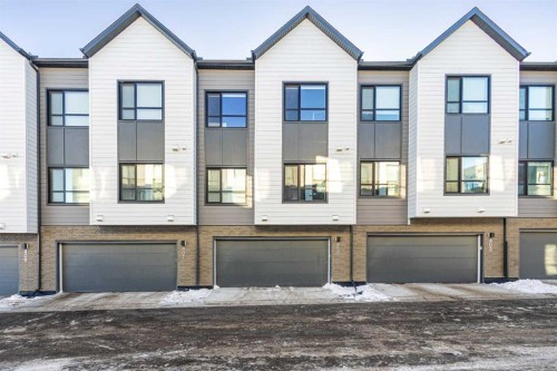 405 20295 Seton Way Se, Calgary, AB - Outdoor With Facade