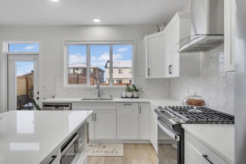 128 Seton Villas Se, Calgary, AB - Indoor Photo Showing Kitchen With Upgraded Kitchen