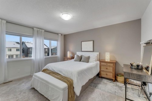 128 Seton Villas Se, Calgary, AB - Indoor Photo Showing Bedroom