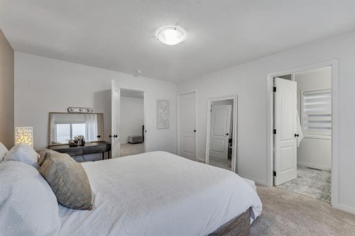 128 Seton Villas Se, Calgary, AB - Indoor Photo Showing Bedroom