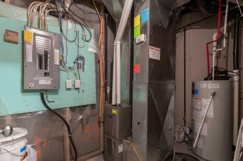 2-4613 17 Avenue Nw, Calgary, AB - Indoor Photo Showing Basement