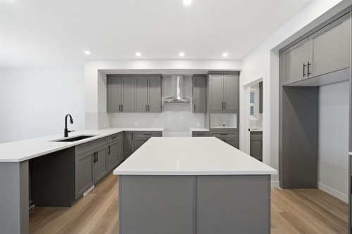 301 Dawson Wharf Road, Chestermere, AB - Indoor Photo Showing Kitchen With Upgraded Kitchen