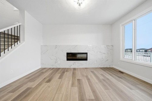 301 Dawson Wharf Road, Chestermere, AB - Indoor With Fireplace