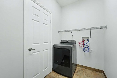 134 Autumn Gardens Se, Calgary, AB - Indoor Photo Showing Laundry Room