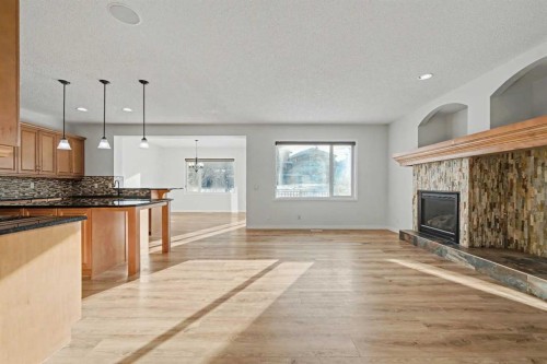 134 Autumn Gardens Se, Calgary, AB - Indoor With Fireplace