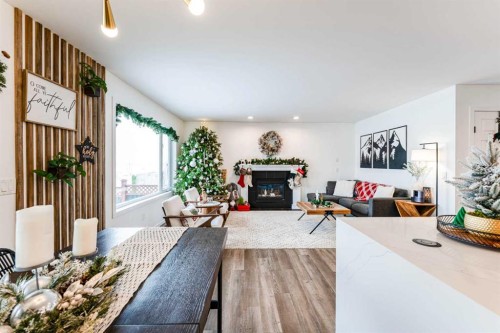 147 Chaparral Ridge Circle Se, Calgary, AB - Indoor Photo Showing Living Room With Fireplace
