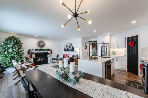 147 Chaparral Ridge Circle Se, Calgary, AB - Indoor Photo Showing Other Room With Fireplace