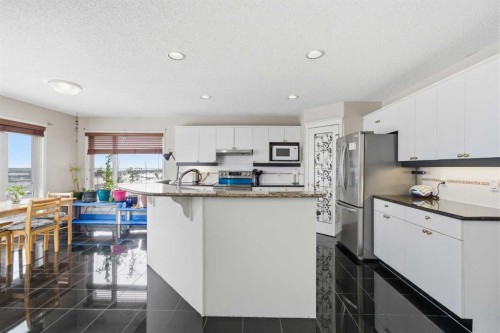 62 Hampstead Gardens Nw, Calgary, AB - Indoor Photo Showing Kitchen With Stainless Steel Kitchen