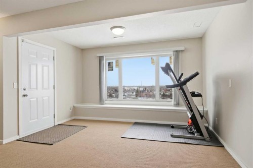 62 Hampstead Gardens Nw, Calgary, AB - Indoor Photo Showing Gym Room