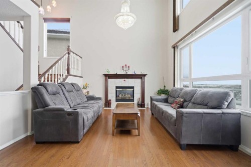 62 Hampstead Gardens Nw, Calgary, AB - Indoor Photo Showing Living Room With Fireplace