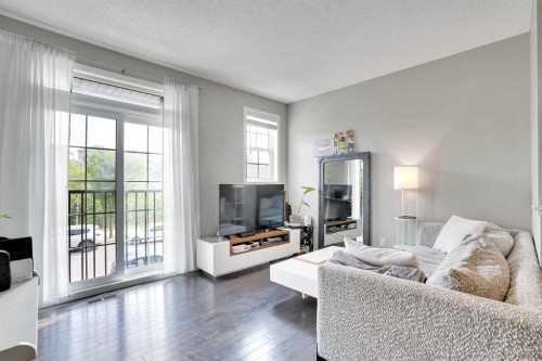 306 Ascot Circle Sw, Calgary, AB - Indoor Photo Showing Living Room