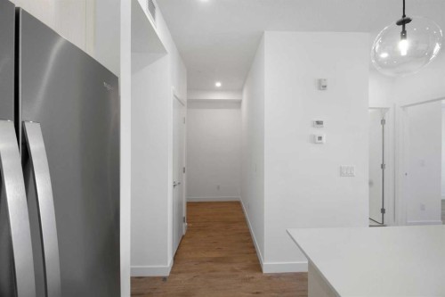 3212-6 Merganser Drive, Chestermere, AB - Indoor Photo Showing Other Room