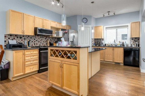 216 Silverado Range Close Sw, Calgary, AB - Indoor Photo Showing Kitchen