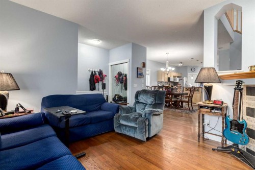 216 Silverado Range Close Sw, Calgary, AB - Indoor Photo Showing Living Room With Fireplace