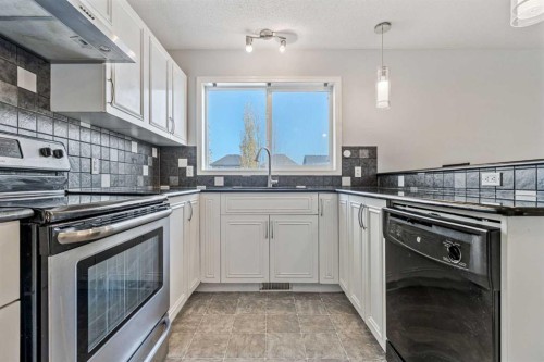 22 Silverado Plains Circle Sw, Calgary, AB - Indoor Photo Showing Kitchen