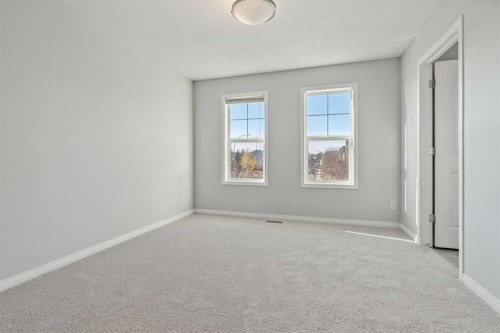 22 Silverado Plains Circle Sw, Calgary, AB - Indoor Photo Showing Other Room