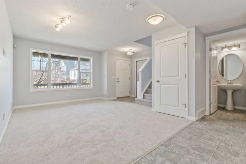 22 Silverado Plains Circle Sw, Calgary, AB - Indoor Photo Showing Other Room