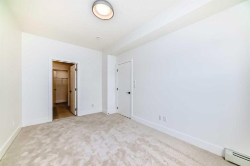 1319-4270 Norford Avenue Nw, Calgary, AB - Indoor Photo Showing Other Room