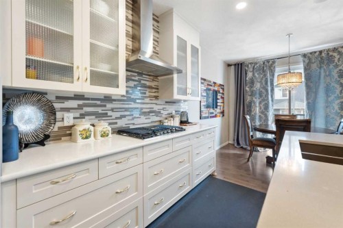 229 Kingsbury Close Se, Airdrie, AB - Indoor Photo Showing Kitchen With Upgraded Kitchen