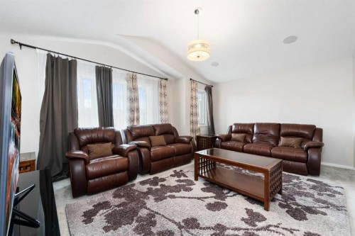 229 Kingsbury Close Se, Airdrie, AB - Indoor Photo Showing Living Room