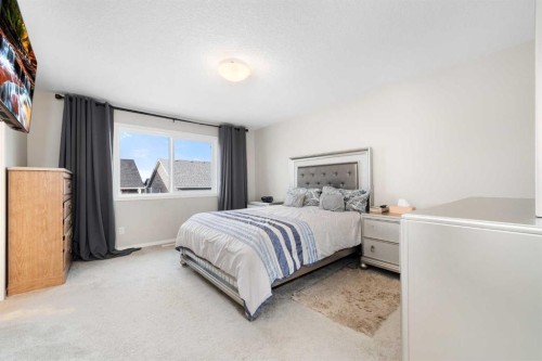 229 Kingsbury Close Se, Airdrie, AB - Indoor Photo Showing Bedroom