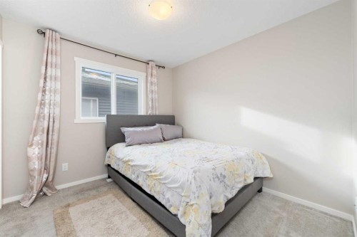 229 Kingsbury Close Se, Airdrie, AB - Indoor Photo Showing Bedroom
