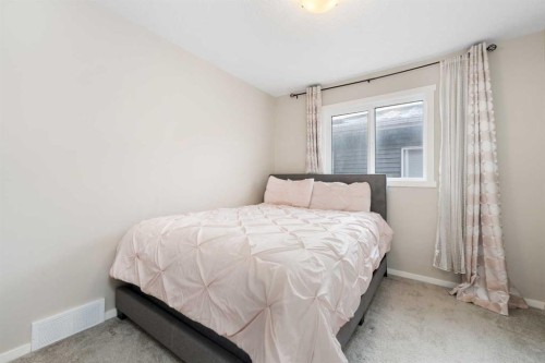 229 Kingsbury Close Se, Airdrie, AB - Indoor Photo Showing Bedroom
