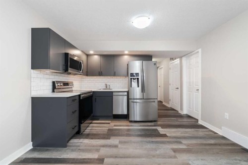 229 Kingsbury Close Se, Airdrie, AB - Indoor Photo Showing Kitchen