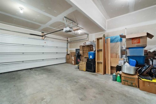 229 Kingsbury Close Se, Airdrie, AB - Indoor Photo Showing Garage