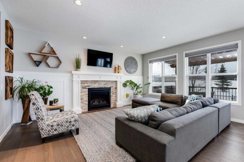200 Auburn Meadows Crescent Se, Calgary, AB - Indoor Photo Showing Living Room With Fireplace