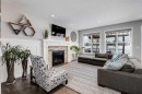 200 Auburn Meadows Crescent Se, Calgary, AB  - Indoor Photo Showing Living Room With Fireplace 