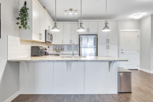 3306-522 Cranford Drive Se, Calgary, AB - Indoor Photo Showing Kitchen With Upgraded Kitchen