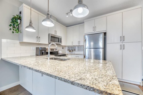 3306-522 Cranford Drive Se, Calgary, AB - Indoor Photo Showing Kitchen With Stainless Steel Kitchen With Double Sink With Upgraded Kitchen