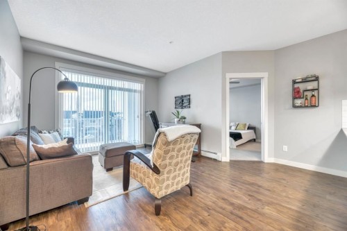 3306-522 Cranford Drive Se, Calgary, AB - Indoor Photo Showing Living Room