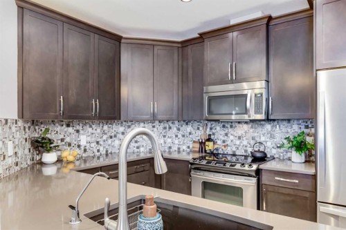 1109-16 Varsity Estates Circle Nw, Calgary, AB - Indoor Photo Showing Kitchen With Stainless Steel Kitchen With Upgraded Kitchen