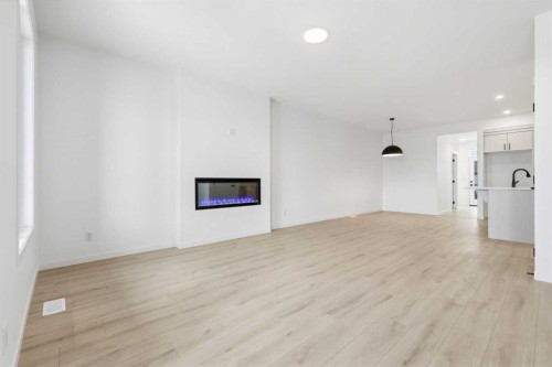 355 Herron Landing Ne, Calgary, AB - Indoor With Fireplace