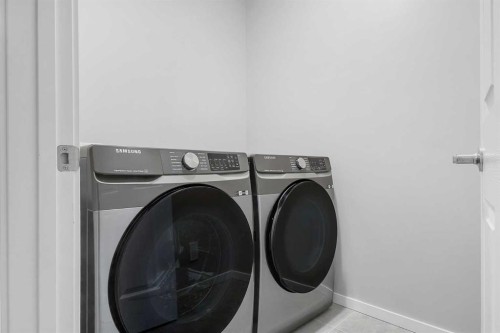 1383 148 Avenue Nw, Calgary, AB - Indoor Photo Showing Laundry Room